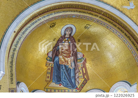 Belgrade, Serbia- 10162024: The Temple Of Saint Sava indoor interior, people pray in an Orthodox church, frescoes on the ceilings and walls of the church. High quality photo Belgrade, Serbia- 10162024: The Temple Of Saint Sava indoor interior, people pray in an Orthodox church, frescoes on the ceilings and walls of the church. High quality photo 122026925