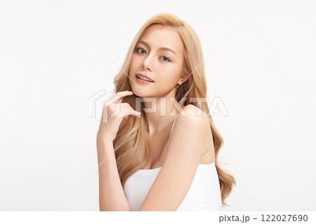 Beautiful young asian woman with clean fresh skin on white background, Face care, Facial treatment, Cosmetology, beauty and spa, Asian women portrait. Beautiful young asian woman with clean fresh skin on white background, Face care, Facial treatment, Cosmetology, beauty and spa, Asian women portrait. 122027690