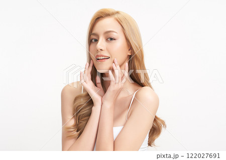 Beautiful young asian woman with clean fresh skin on white background, Face care, Facial treatment, Cosmetology, beauty and spa, Asian women portrait. Beautiful young asian woman with clean fresh skin on white background, Face care, Facial treatment, Cosmetology, beauty and spa, Asian women portrait. 122027691