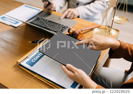 Lawyer or judge consult having team meeting at law office. Law and Legal services concept. Lawyer or judge consult having team meeting at law office. Law and Legal services concept. 122028020