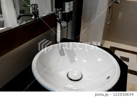 Modern square sink in the bathroom Modern square sink in the bathroom 122030634