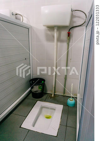 paid Muslim toilet. toilet stall in the bazaar of Kazakhstan 122031333