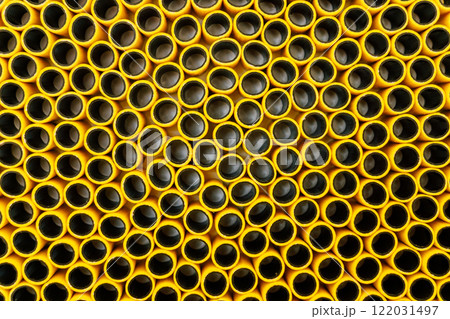texture of yellow plastic hose. pieces of rubber hose stuck together texture of yellow plastic hose. pieces of rubber hose stuck together 122031497