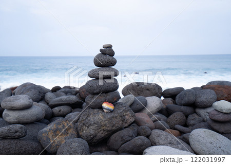 Balance stone tower on sea shore Balance stone tower on sea shore 122031997