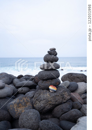Balance stone tower on sea shore Balance stone tower on sea shore 122031998