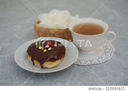 donut and cup on the marble table donut and cup on the marble table 122032811