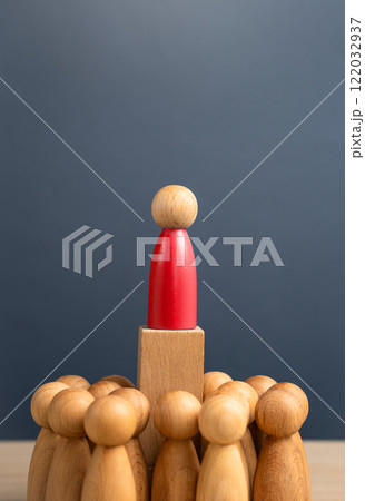 The red man rises above the crowd. The leader of the group. Elected Governor. Head of a political force. Owner of the company. Boss. Candidate for elections. The red man rises above the crowd. The leader of the group. Elected Governor. Head of a political force. Owner of the company. Boss. Candidate for elections. 122032937