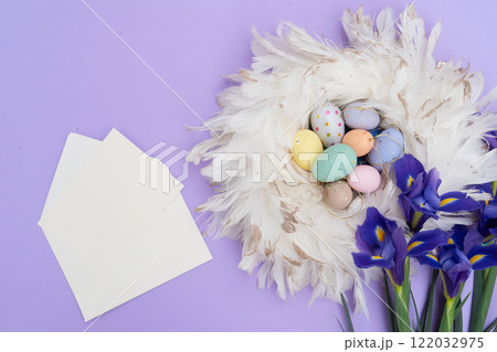 Easter colored eggs in nest 122032975