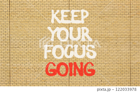 Keep your focus going symbol. Concept words Keep your focus going on beautiful brick wall. Beautiful brick wall background. Business and keep your focus going concept. Copy space 122033978