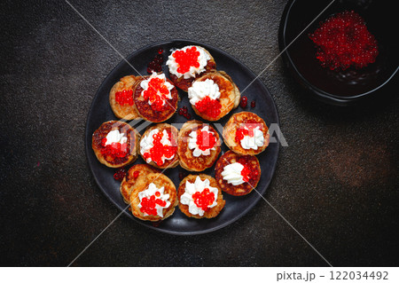 Demidoff pancakes, mini pancakes, with sour cream and red caviar, crepes. homemade, no people, Demidoff pancakes, mini pancakes, with sour cream and red caviar, crepes. homemade, no people, 122034492