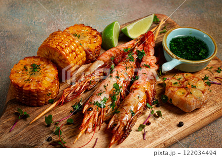 langoustines on skewers, shrimp kebab, with fried corn, spices and herbs, homemade, no people, langoustines on skewers, shrimp kebab, with fried corn, spices and herbs, homemade, no people, 122034494