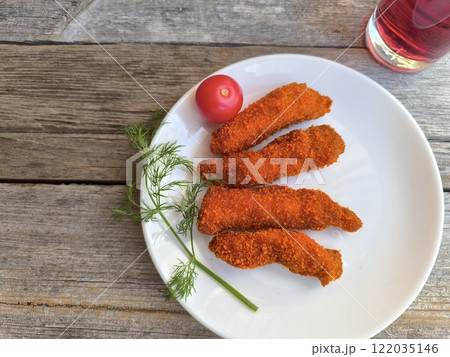 Chicken nuggets on a plate. Top view High-quality photo Chicken nuggets on a plate. Top view High-quality photo 122035146