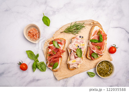 Assorted delicious baguette sandwiches Assorted delicious baguette sandwiches 122035588