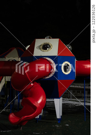 Playground at night in the park under a street lamp Playground at night in the park under a street lamp 122036126