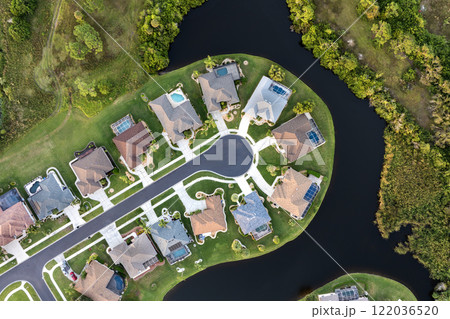 View from above of residential houses in living area in North Port, FL. American dream homes as example of real estate development in US suburbs 122036520