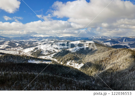 Winter landscape with spruse trees of snow covered forest in cold mountains. Winter landscape with spruse trees of snow covered forest in cold mountains. 122036553