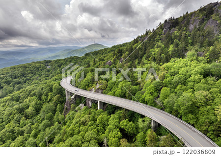 Linn Cove Viaduct road bridge in North Carolina Appalachian mountains, USA. Blue Ridge Parkway American highway in summer rain season 122036809