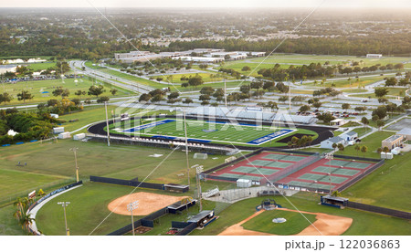 Public high school sports facilities in Florida. American football stadium, tennis courts and baseball diamond sport infrastructure 122036863