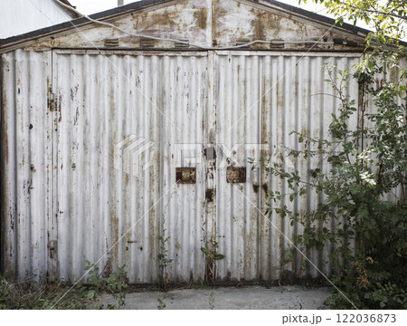 old metal door to the car garage 122036873