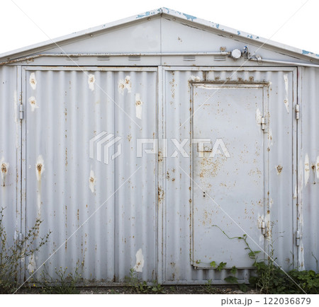 old metal door to the car garage old metal door to the car garage 122036879