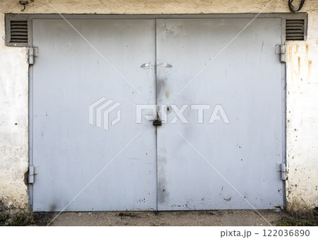 old metal door to the car garage 122036890