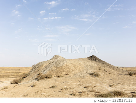 photo of a mud volcano eruption, landscape photography 122037113