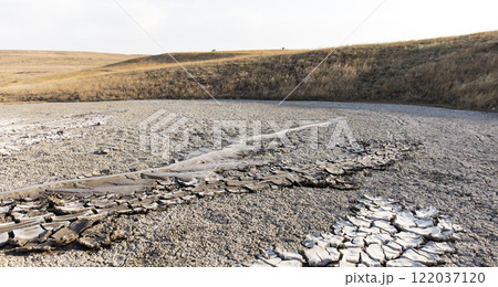 photo of a mud volcano eruption, landscape photography photo of a mud volcano eruption, landscape photography 122037120