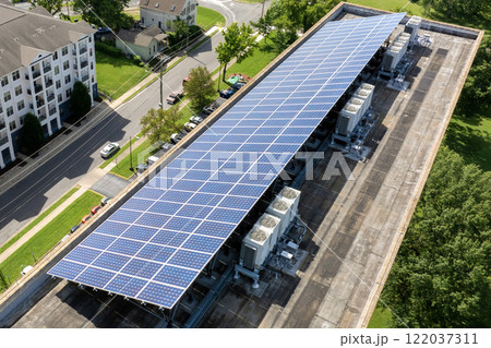 Autonomous building with photovoltaic rooftop covered with solar panels for producing of clean ecological electrical energy in city center 122037311
