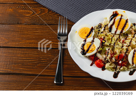 Moonlit clouds partially obscure the night sky over Lviv, Ukraine 122039169