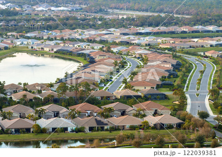 Rich neighborhood with expensive residential homes in southwest Florida. Wealthy suburban area 122039381