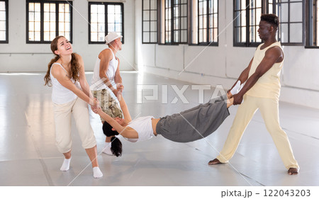 dancers training in a dance studio dancers training in a dance studio 122043203