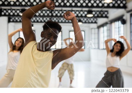 Happy adults training swing steps at class 122043379