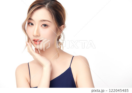 Beautiful young asian woman with clean fresh skin on white background, Face care, Facial treatment, Cosmetology, beauty and spa, Asian women portrait. Beautiful young asian woman with clean fresh skin on white background, Face care, Facial treatment, Cosmetology, beauty and spa, Asian women portrait. 122045485