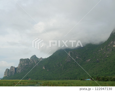 Cloud and fog cover limestone mountain in the rainy season, Green forest and rock at Khao Sam Roi Yot National Park, Thailand 122047130