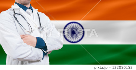 India Health and Care concept. Professional doctor on India flag. Doctor with crossed arms on India flag 122050152