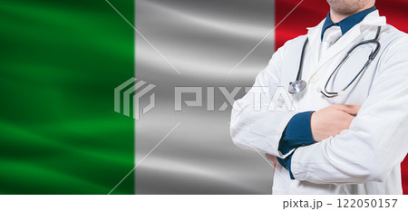 Italy Health and Care concept. Male doctor on Italy flag. Doctor with crossed arms on Italy flag 122050157