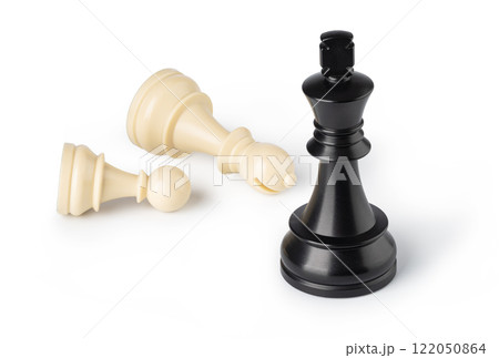 Black king standing while white pawns are down on white background 122050864