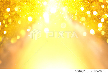 キラキラとまばゆい光が反射する黄色のグラデーション背景 122052892