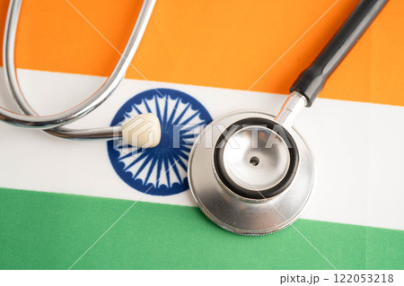 Indian flag with black stethoscope, Business and finance concept. Indian flag with black stethoscope, Business and finance concept. 122053218