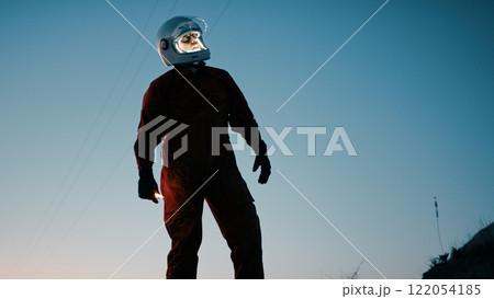 Silhouette Of An Astronaut Explores A New Abandoned Planet At Night Silhouette Of An Astronaut Explores A New Abandoned Planet At Night 122054185