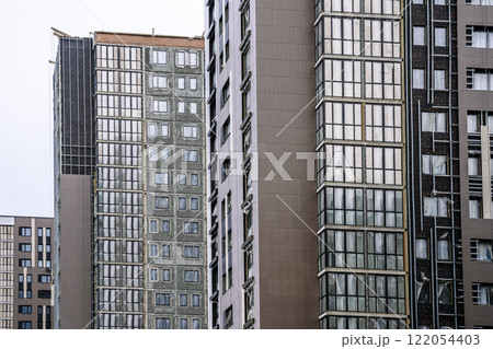 Construction of a modern apartment building. Construction and sale of real estate 122054403