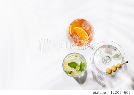 A vibrant display of cocktails, including Aperol Spritz, Mojito, and Martini 122054663