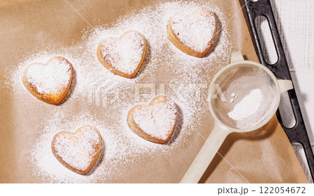 Delightful homemade heart-shaped cookies, perfectly crafted for Valentines Day Delightful homemade heart-shaped cookies, perfectly crafted for Valentines Day 122054672