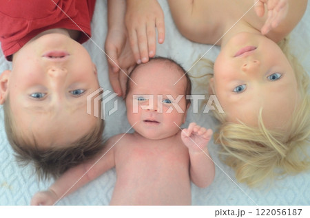 Three blue-eyed children of one family 122056187