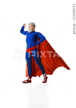 Vision, creativity and innovation. Man in superhero costume standing in a confident pose and looking forward with focus 122056731
