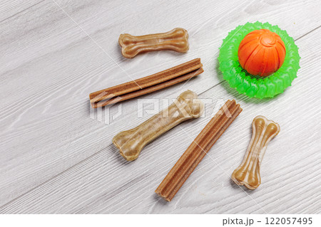 Pet supplies and playful items including dry food and toys for dogs. Pet supplies and playful items including dry food and toys for dogs. 122057495