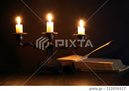 Book Near Candle Book Near Candle 122059317