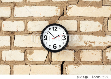 Clock On A Brick Wall 122059599