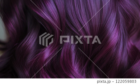 Glossy purple hair cascades in soft waves, catching the light beautifully for a striking effect. 122059803
