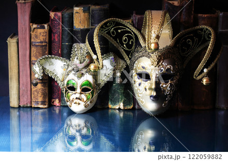 Masks And Books 122059882